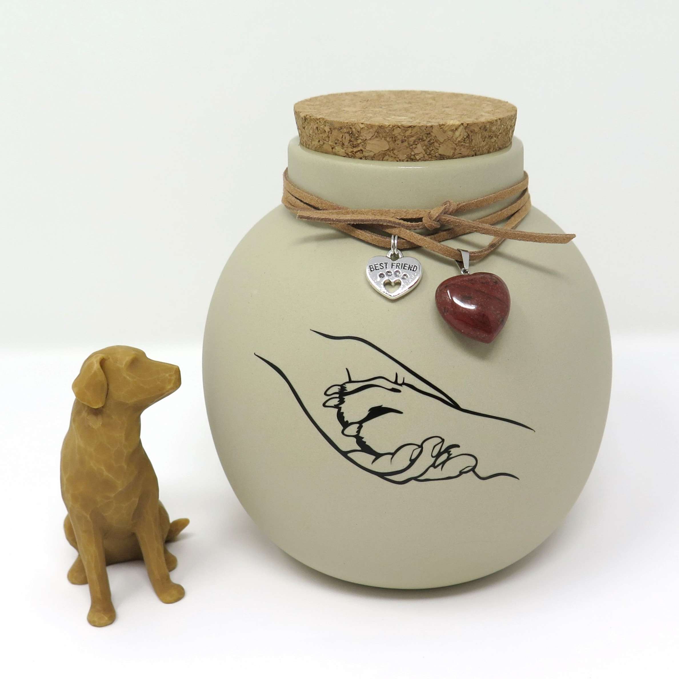 Hundeurne in Vasenform mit Hand in Pfote Motiv