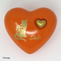 Katzenurne in Herzform mit aufgemalter Katze Orange
